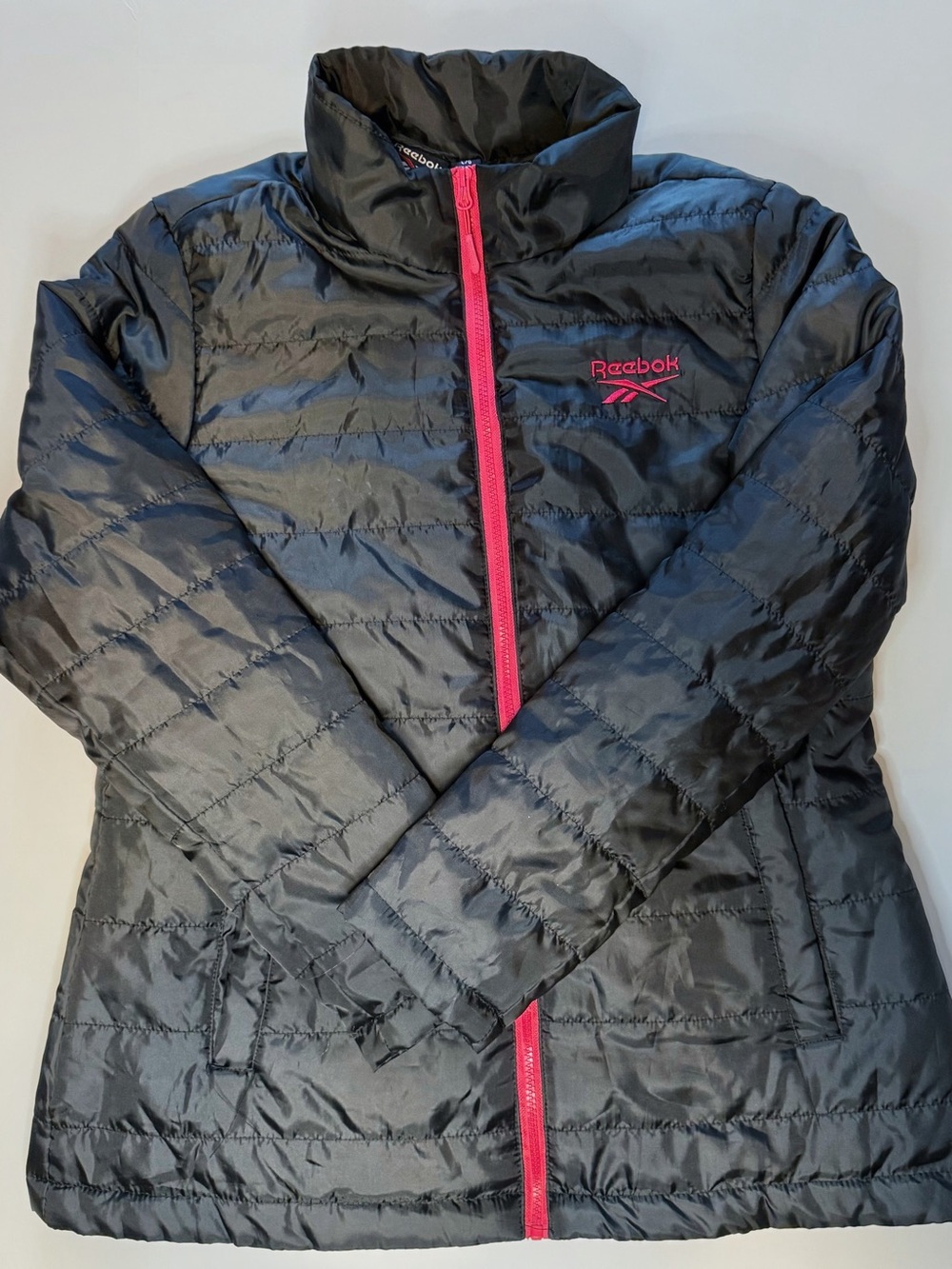 Reebok Women's Black Puffer Jacket with Pink Zipper and Logo